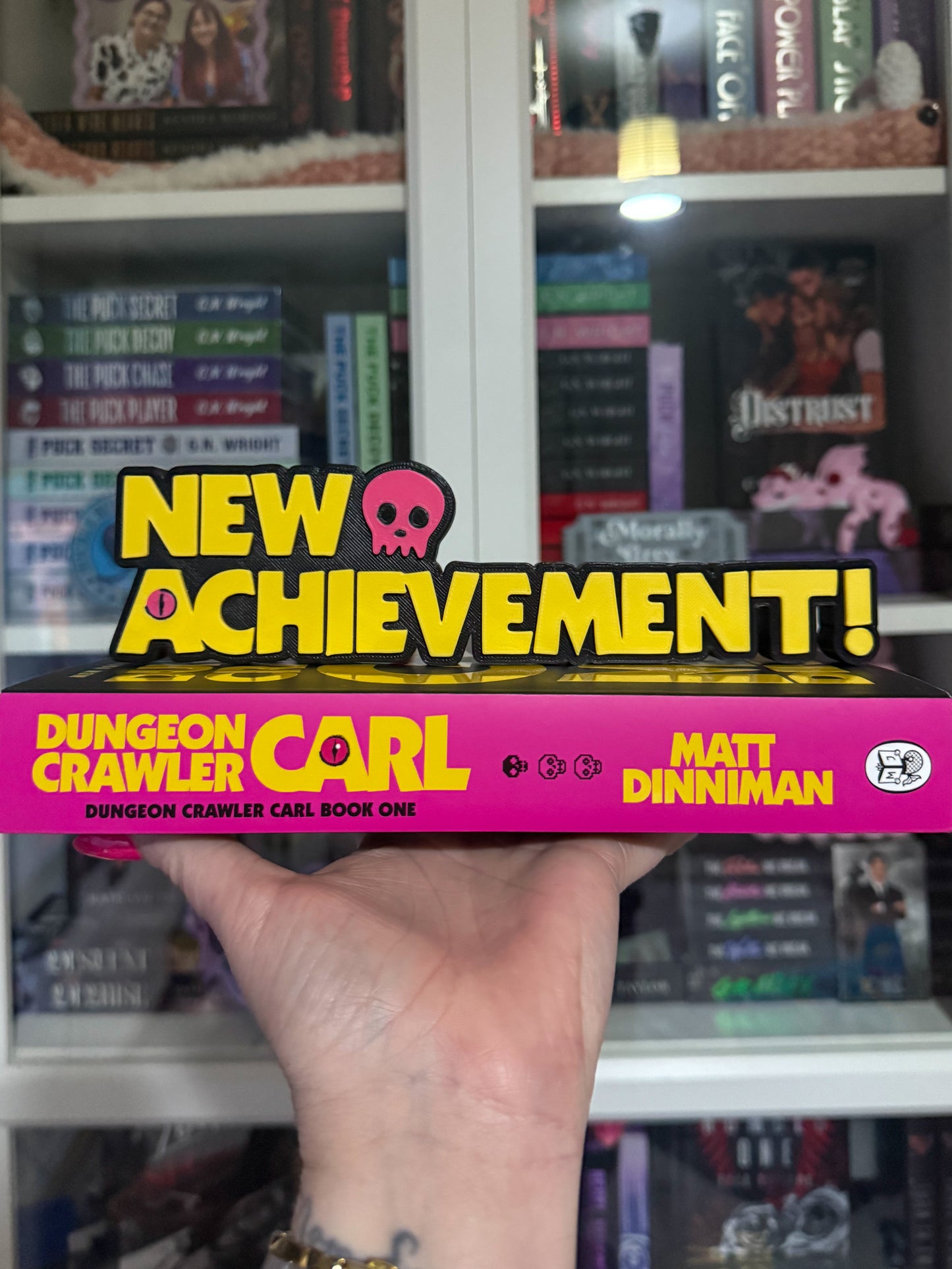 DCC New Achievement Bookshelf Sign