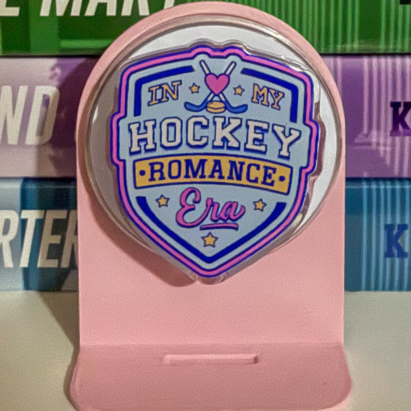 In my Hockey Romance Era Magnetic Phone/Kindle Grip